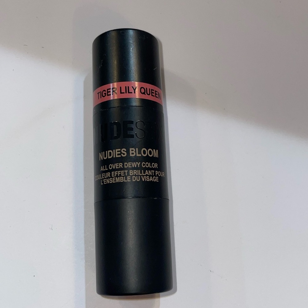 Nudestix all over face color in shade Tiger Lily Queen.
